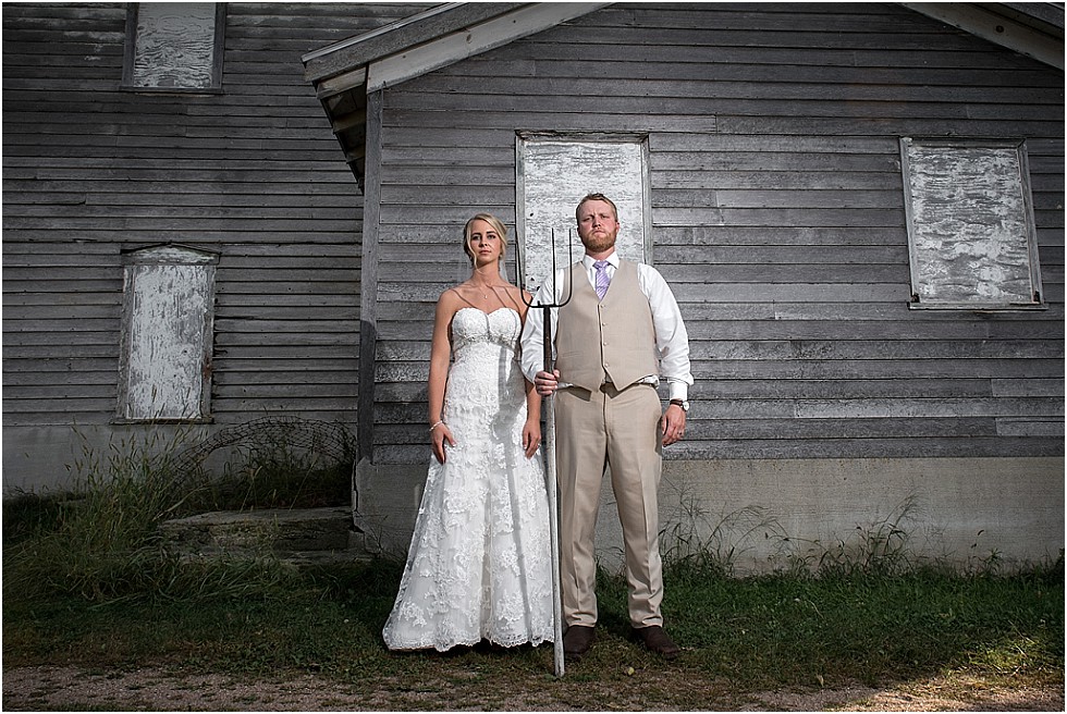 bride and groom American Gothic pose