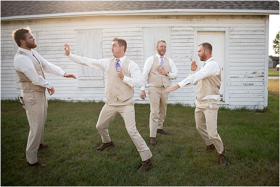 groom and brothers doing kung fu moves