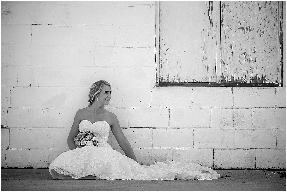 bride sitting against wall black and white O'Neill Nebraska