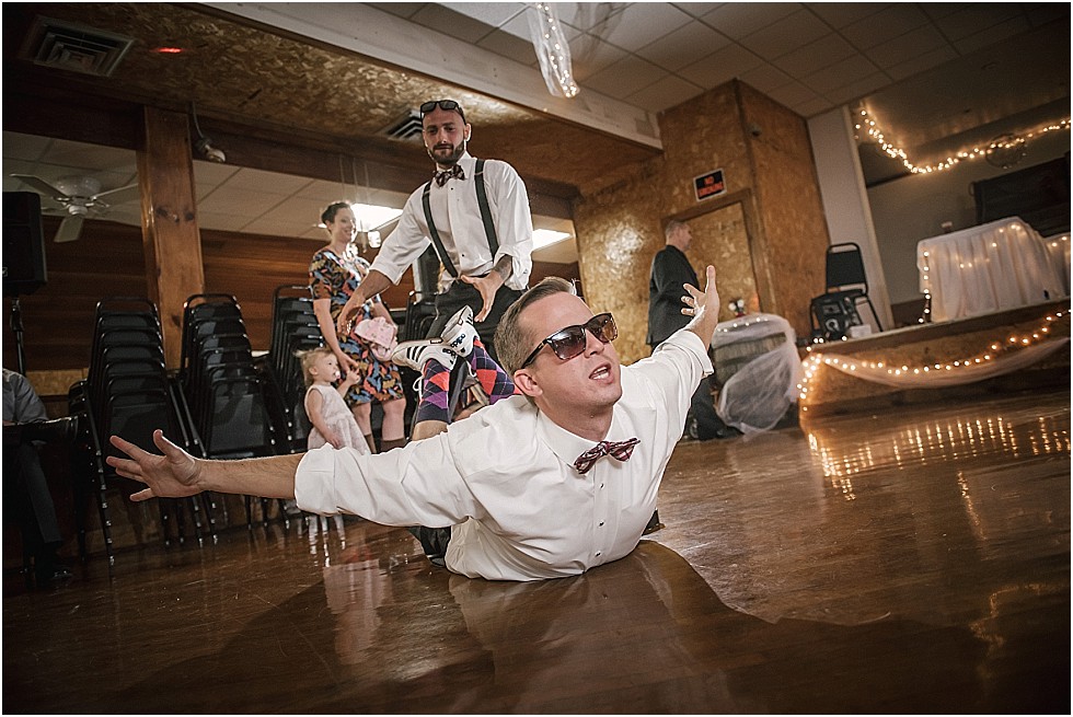 groomsmen having fun during dance