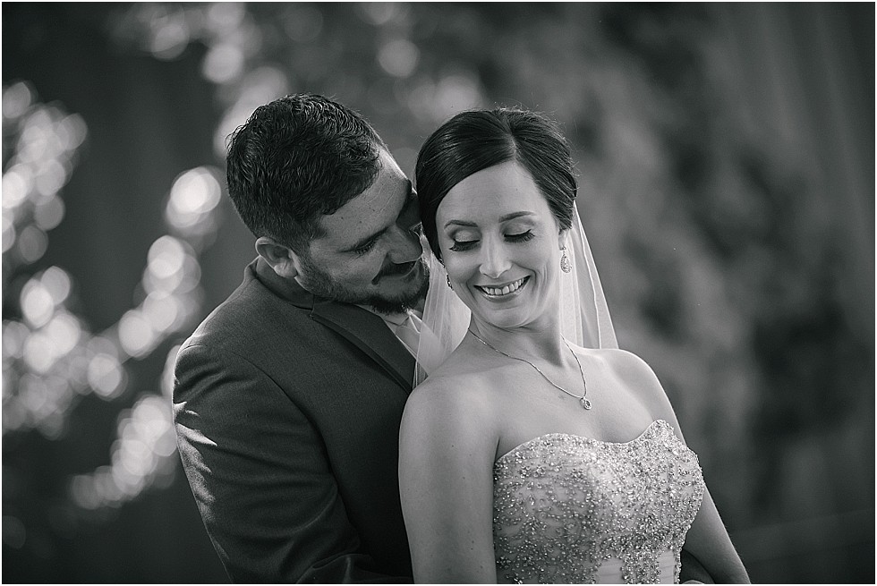 bride and groom romantic black and white photo at Sunken Gardens Lincoln Nebraska