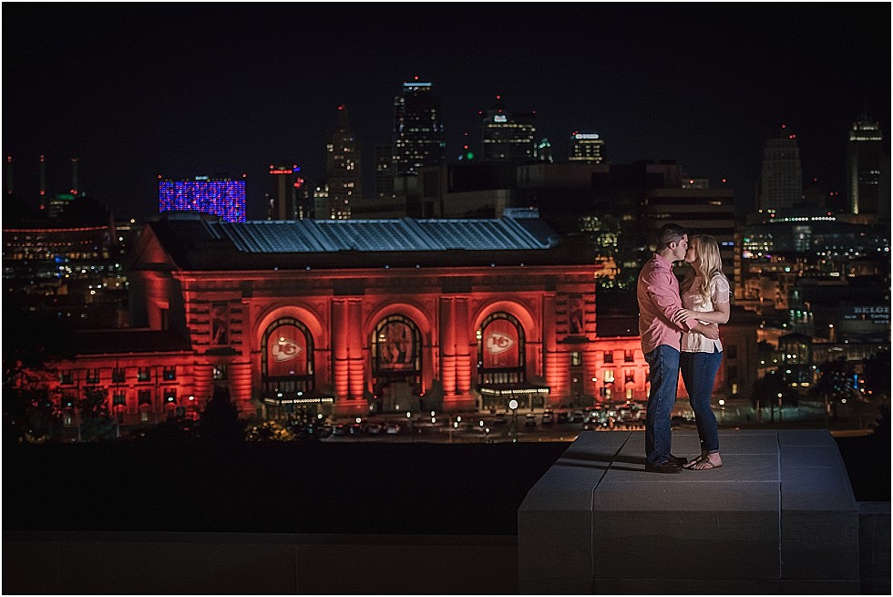 couple kissing in front of Union Station Kansas City