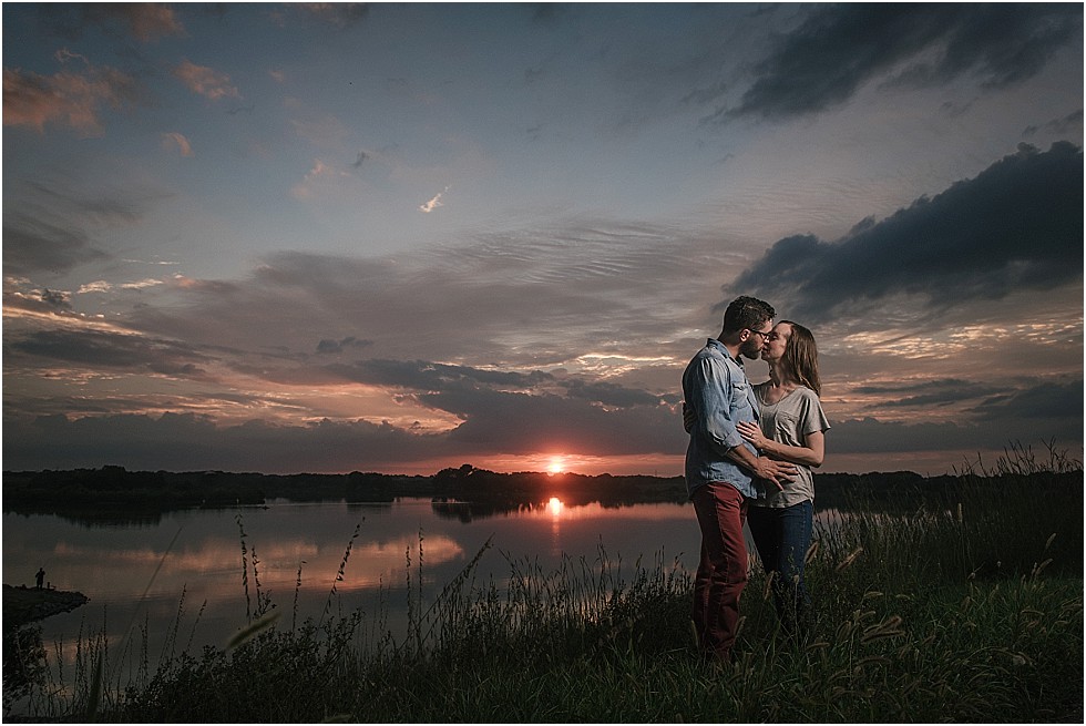 couple kissing at sunset at Yankee Hill Lake