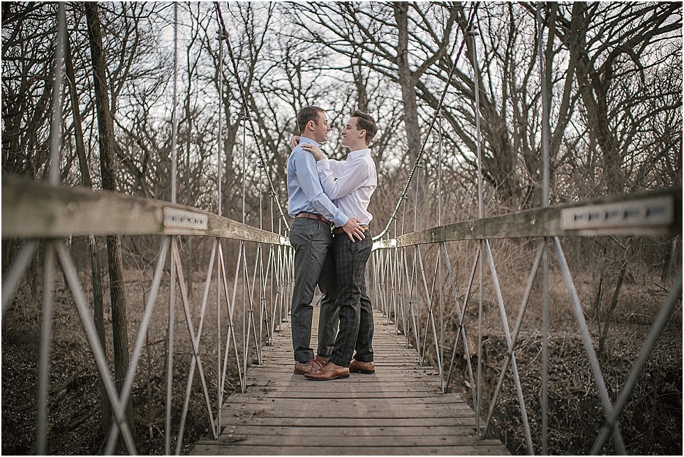 couple on walking bridge in Wilderness Park