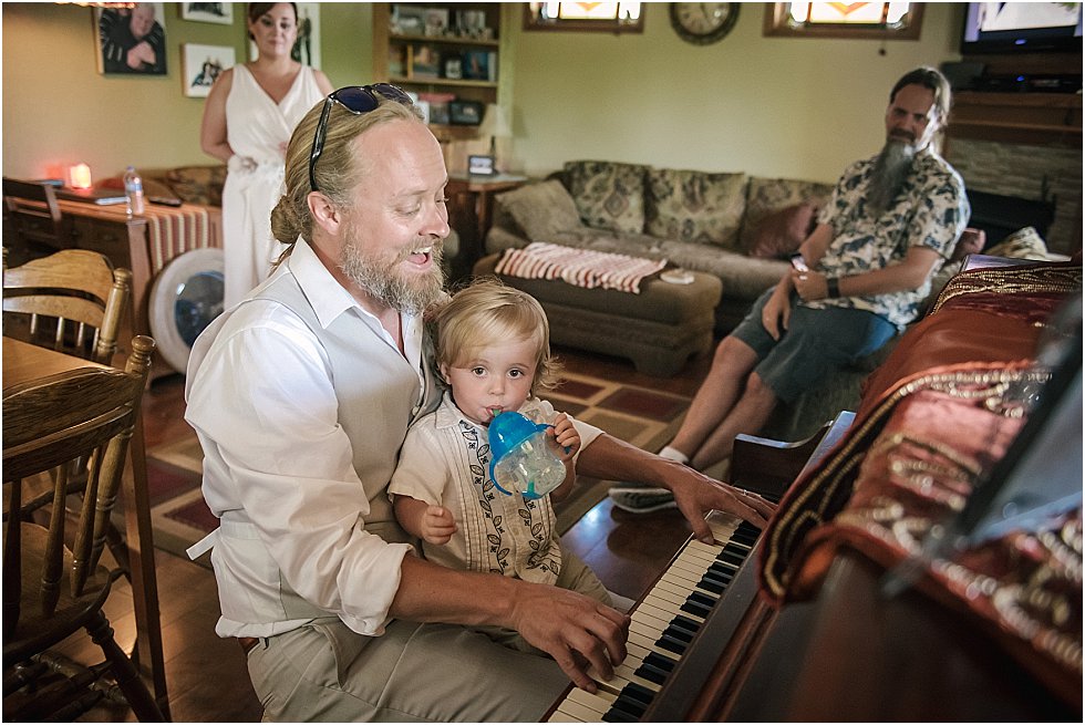 groom plays piano for son