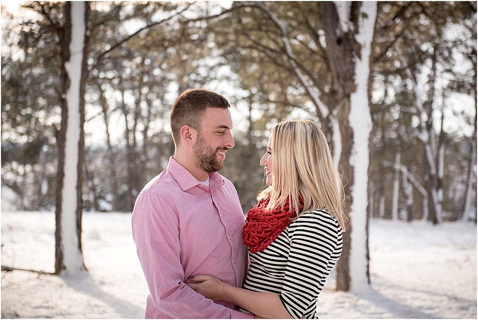 couple looking into each other's eyes at engagement session Lincoln Nebraska