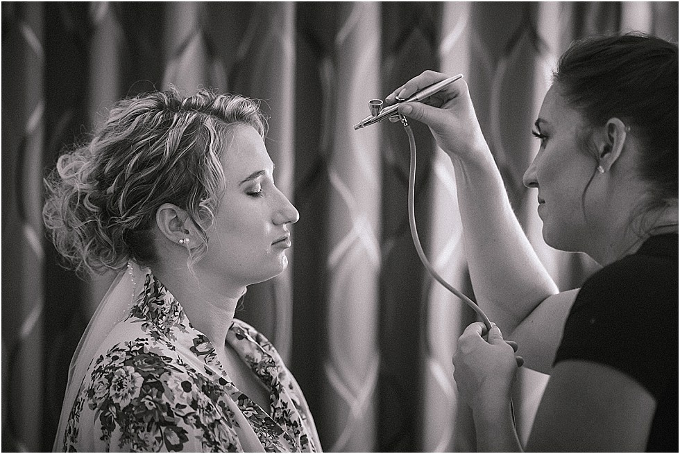 bride getting make up done