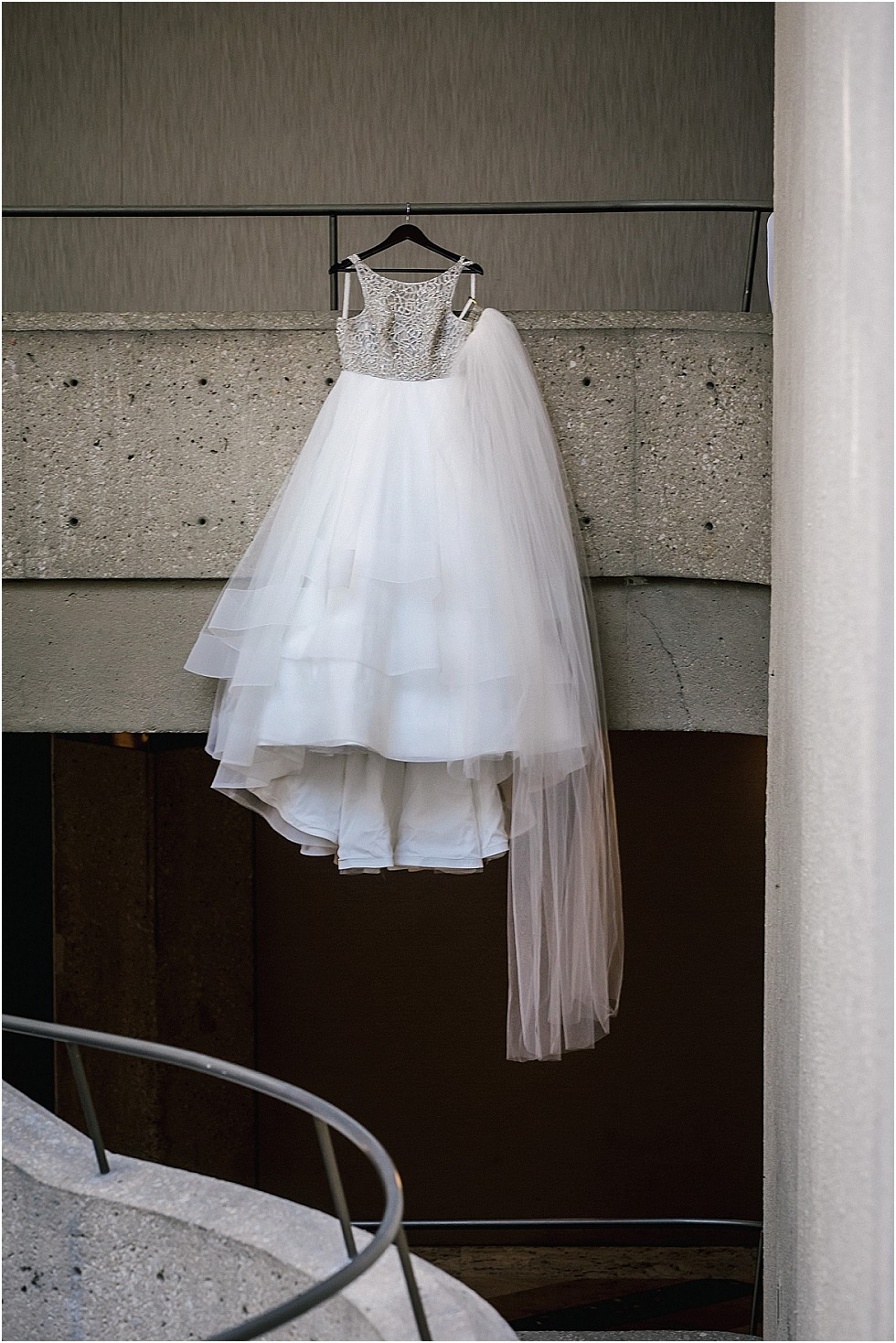 wedding dress hanging in the Westin Crowne Center